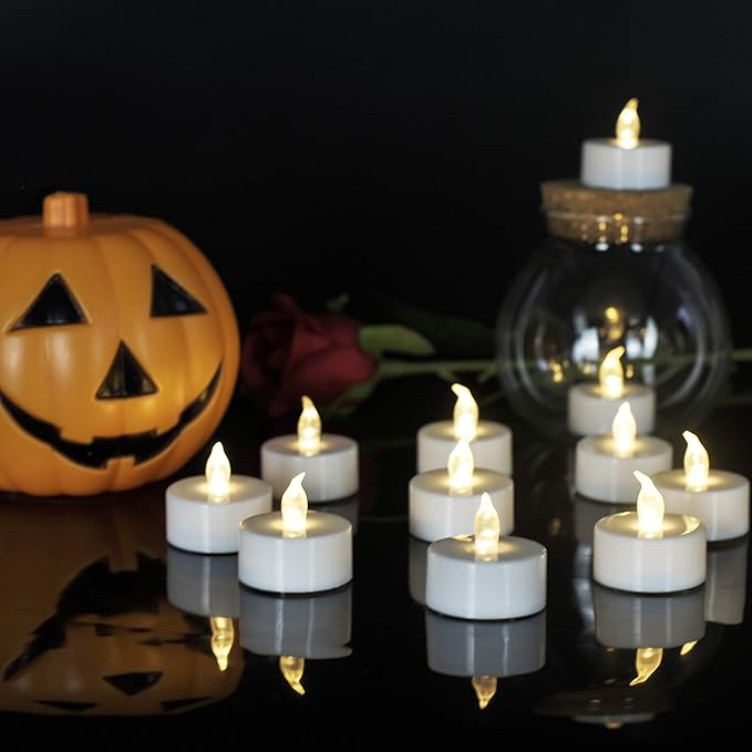 JUNPEI Battery Operated Powered Tea Lights : Realistic Tea Lights Flickering Candles Holiday Gift Suitable for Wedding Parties Festival Celebration Long Lasting (100pack Warm White)